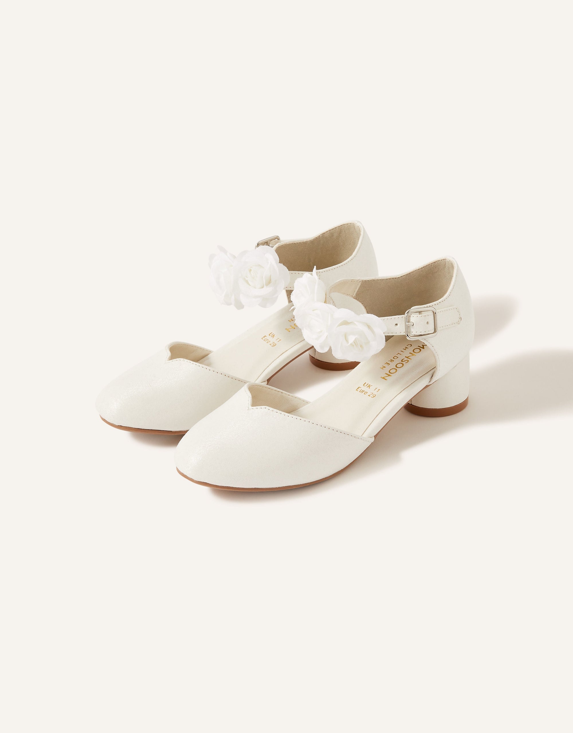 IVORY HEEL CORSAGE